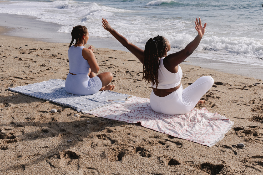 Black women entrepreneurs bonding over healthy activities to boost their business and personal growth.